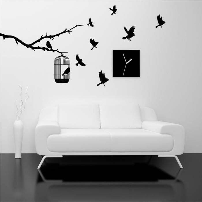 Kuvio mustavalkoisessa seinäsuunnittelussa, jossa on värillisiä esimerkkejä mustavalkoisesta olohuoneen sisustustatuoinnista