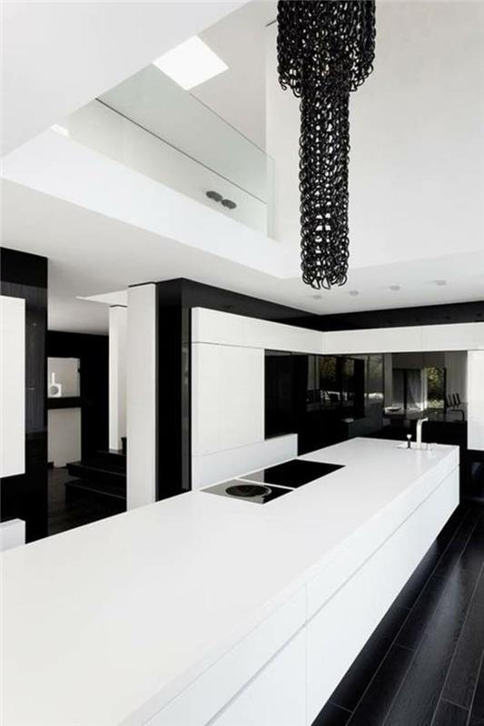 Kuvio mustavalkoisena seinänä, jossa väri musta valkoinen olohuone sisustaa valkoinen musta keittiö