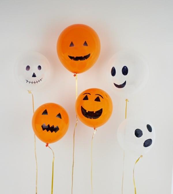 ideoita valkoisiin oransseihin ilmapalloihin halloween -koristeluun