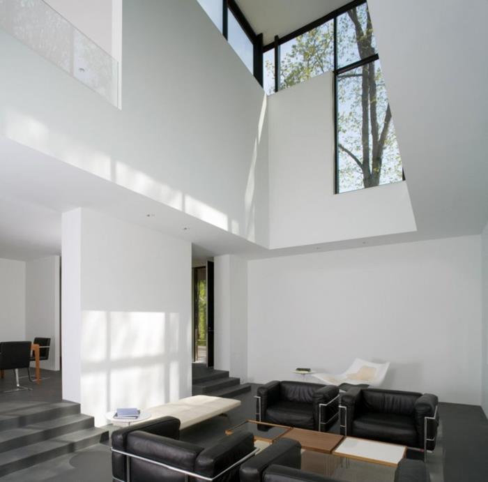 valkoinen seinän väri kotiideoita olohuone musta nahka nojatuolit sisätilojen portaat