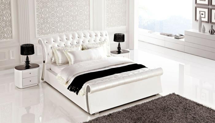 valkoinen makuuhuone beige matto musta pöytävalaisin