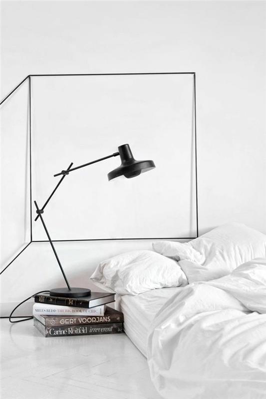 valkoinen makuuhuone minimalistinen seinäkoriste musta lamppu