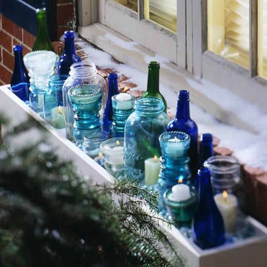 joulukoristeita ikkunakoristeita kynttilöitä lasipulloja