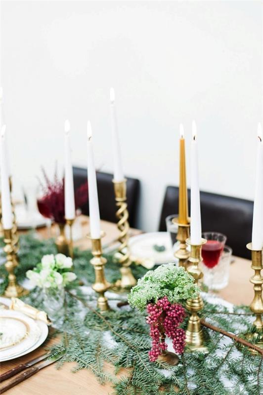 Joulupöydän koristelu kuusen oksat
