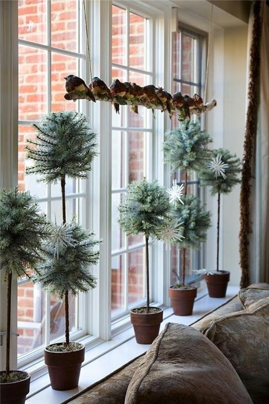 joulukoristeikkunat suuret ikkunat koristavat lintuja kasvien ruukkuja