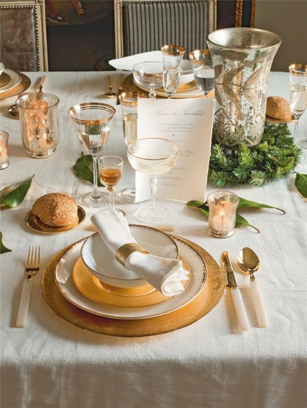joulukoristeiden ideoita pöytäkoristeet kuusen oksat kulta vintage lasit lautaset ruokailuvälineet