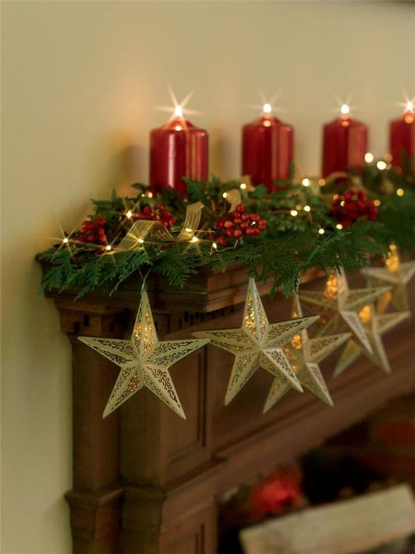 joulukoristeita ideoita takkalevy keiju valot tähdet punaiset pilarin kynttilät