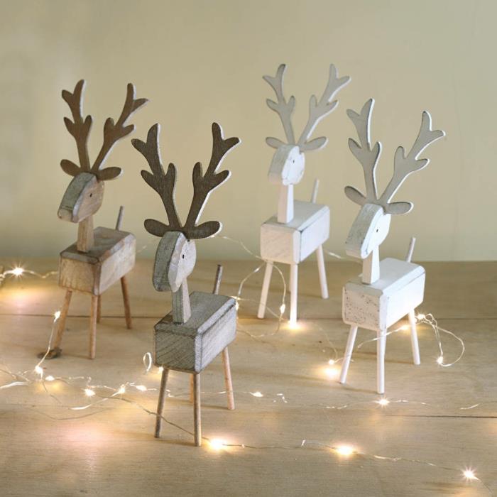 joulukoristeita ideoita skandinaaviseen tyyliin puiset keiju valot peuroja