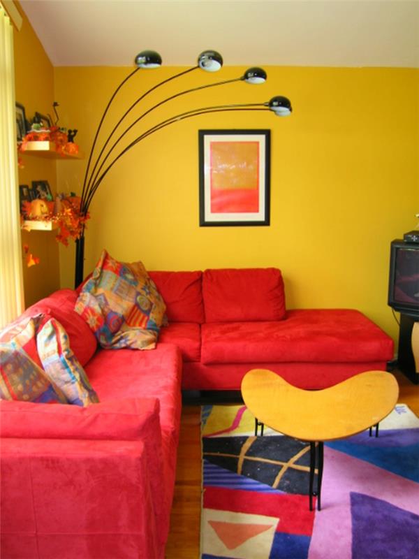 maalaus seinät ideoita olohuone keltainen seinämaali värikäs matto