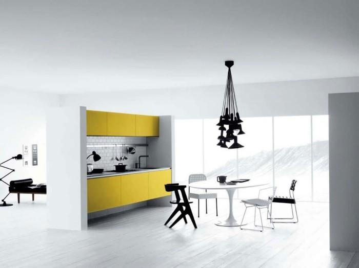elävät ideat keittiö minimalistinen keltainen keittiökaapit valkoinen pyöreä pöytä