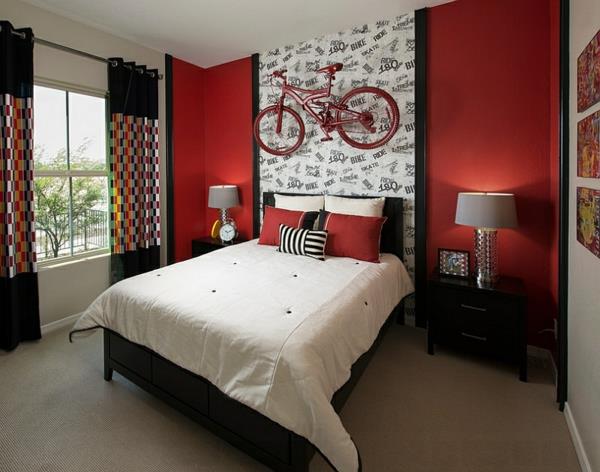 makuuhuone punainen seinä design aksentti seinä mustat huonekalut