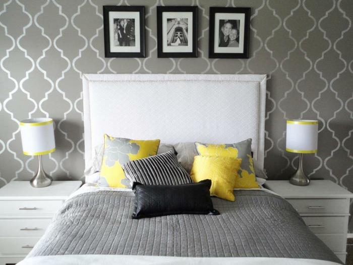 elävät ideat makuuhuoneen tapetti kuvio harmaa keltainen elementit valkoinen sängynpääty