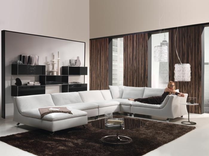 olohuoneet olohuone ruskea matto valkoinen sohva pyöreä sohvapöytä