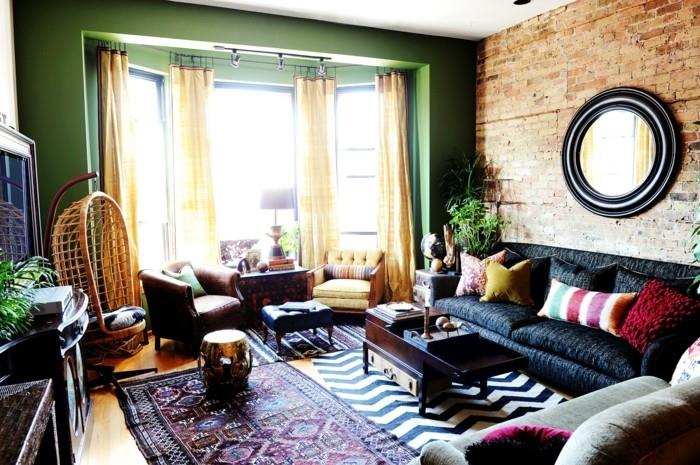olohuone vihreä seinän väri tumma sohva eklektinen