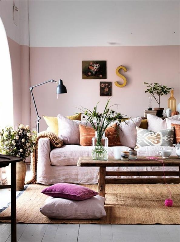 olohuoneet olohuone vaaleanpunainen sohvapäällinen vaaleanpunaiset seinätyynyt