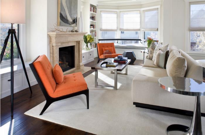 eläviä ideoita olohuone oranssi nojatuoli kirkas matto takka tyylikäs