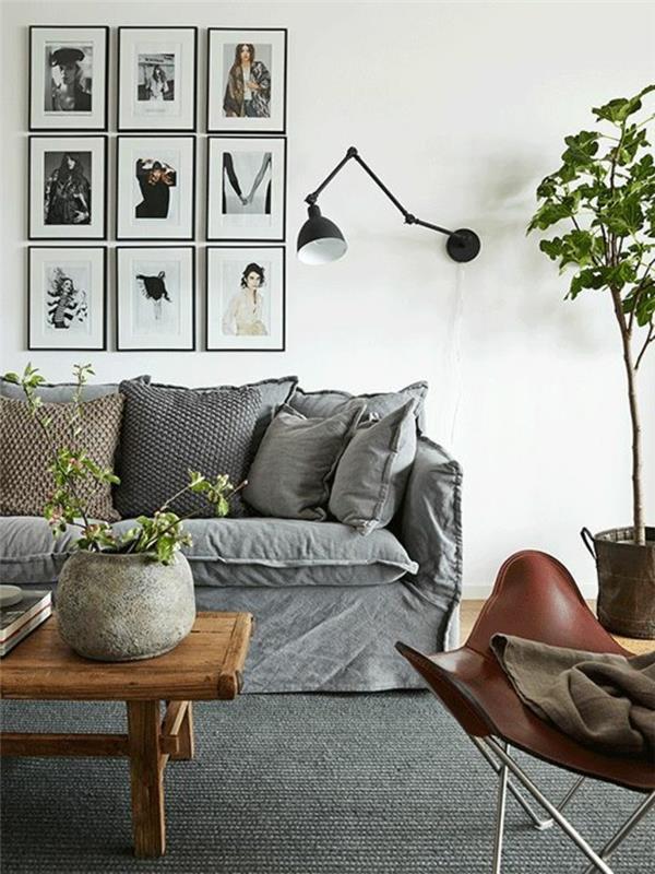 olohuoneen sohvan kansi harmaa kasviseinä taide harmaa matto