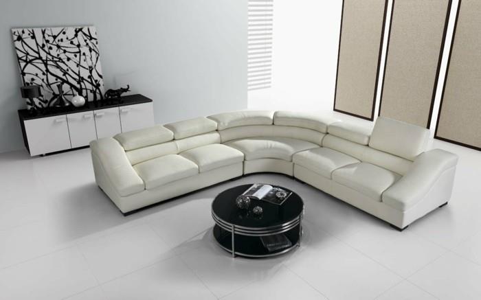 olohuoneet olohuone tyylikäs kulmasohva pyöreä sohvapöytä lattialaatat deco -ideoita