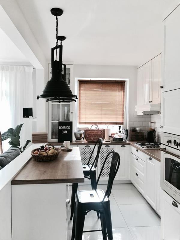 Kalustettu keittiö-olohuone pieni keittiö mustavalkoinen