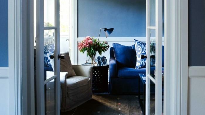 asunnon sisustusideoita art deco olohuone sininen sohva kasvi