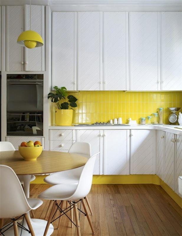 huoneistokalusteet keittiökalusteet keltainen keittiö takaseinä valkoinen keittiökaapit