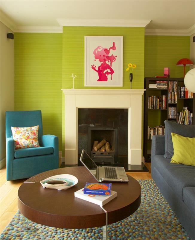olohuoneen sisustusideoita vihreä aksentti seinä pyöreä sohvapöytä värillinen matto