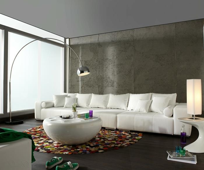 olohuone moderni sisustus pyöreä matto valkoinen sohvapöytä moderni valaistus