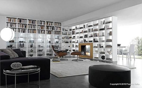 olohuoneen hyllyt kirjat nojatuolit valkoinen valaistu moderni