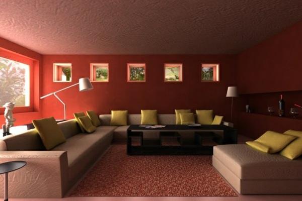 olohuoneen sohvan seinäväri kastanjanruskea kulmasohva beige -tyynyissä vaaleanvihreä