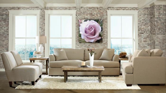 olohuone kiviseinä maalaismainen sohvapöytä valkoinen matto