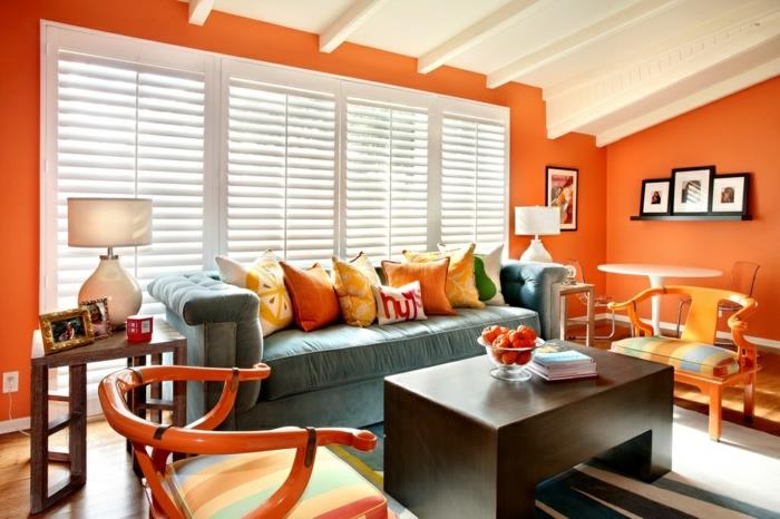olohuone maalausideoita oranssi seinät heittää tyynyt vaaleansininen sohva