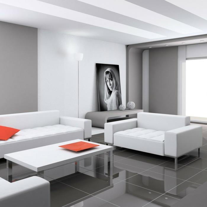 olohuoneen laatat harmaat lattialaatat valkoiset huonekalut oranssi aksentti