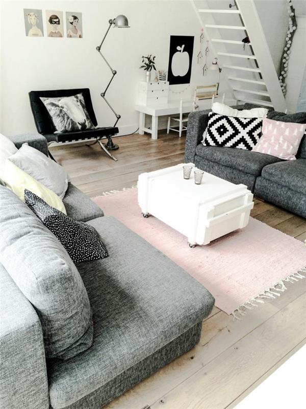 huonekalut-ideat-olohuone-vaaleanpunainen-matto-valkoinen-sohvapöytä