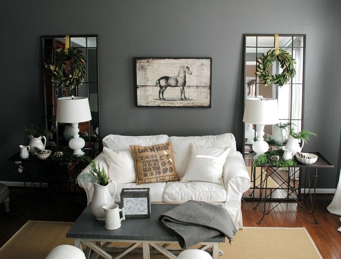 Huonekalut-ideat-olohuone-valkoinen-sohva-harmaa-seinä-kasvit