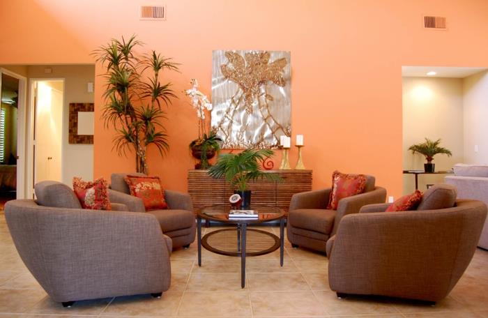 huoneen väri pyöreä sohvapöytä nojatuoli oranssi seinän väri