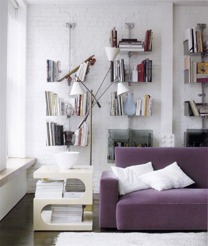 huonesuunnittelu valkoinen tiiliseinä olohuone violetti sohva
